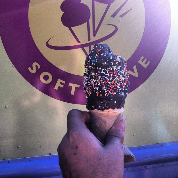 Rainbow sprinkles on soft serve dipped in TCHO chocolate.  Even ice cream is feeling celebratory!