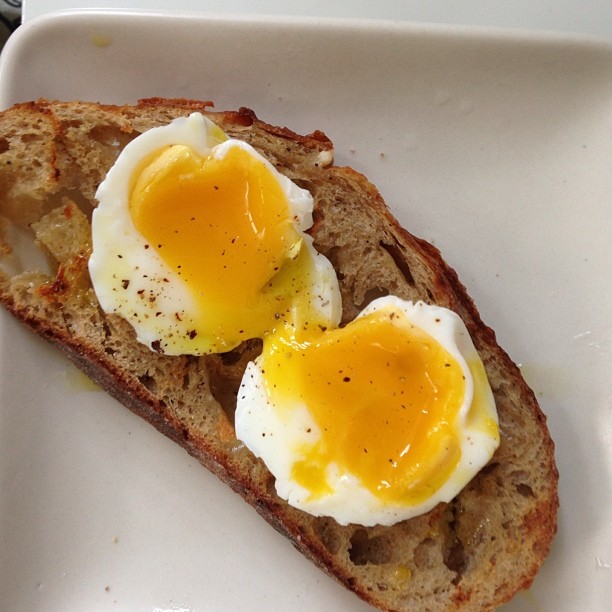 My happy breakfast: Toasted Parm and Black Pepper bread from #JoseyBaker and soft farm egg