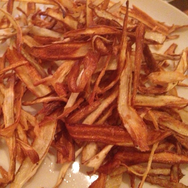 A favorite new adductive snack you can make at home: Burdock chips! Take a root (Gobo) lightly scrubbed (leave on Rough Brown skin). Then peel into thin strips. Fry into about a eighth of an inch of hot oil in a pan till light brown. Drain on towel and sprinkle with a pinch of sea salt. Also works well with carrots. You can find burdock at #CUESA farmers market or @Nijiya Market.
