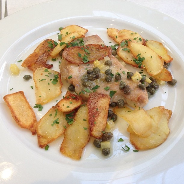 @SFCooking Professional Culinary Students Finals l: Restaurant Week: 2nd Course: Pork Scaloppini in preserved lemons and caper sauce, with roasted potatoes. #SFCooking #restaurant