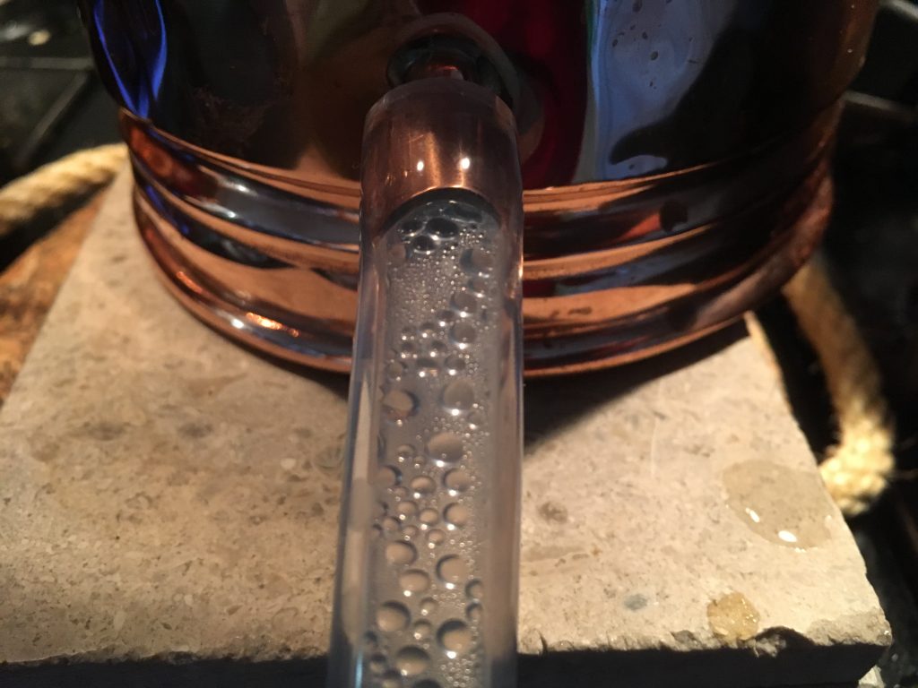 dripping hydrosol through tubing into a basin